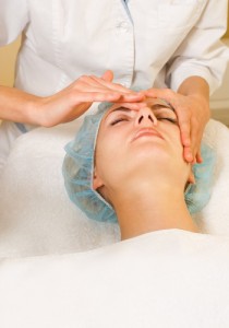Woman getting a facial peel