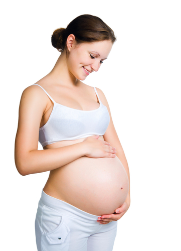 Pregnant woman holding her belly