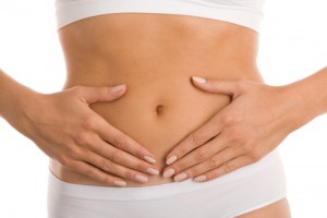 Woman touching her stomache