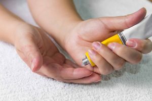 Person applying hand cream