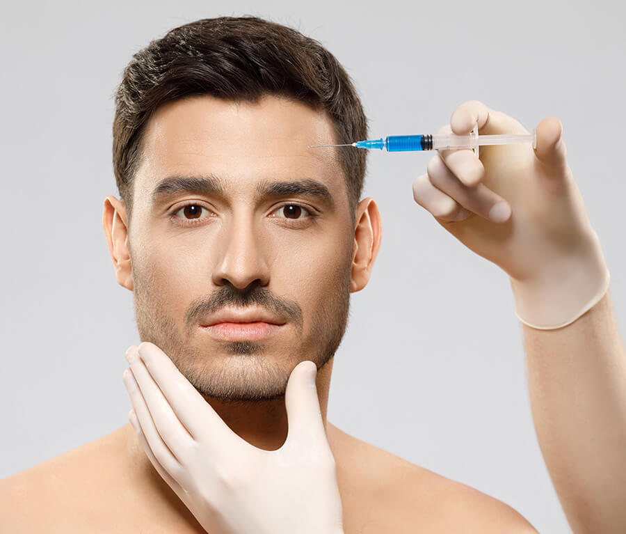Man receiving a face injection