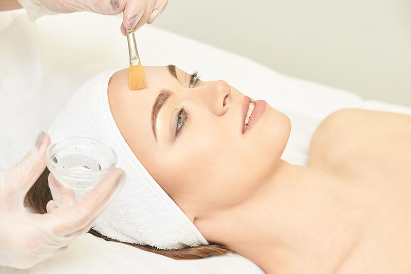 Woman getting a chemical peel