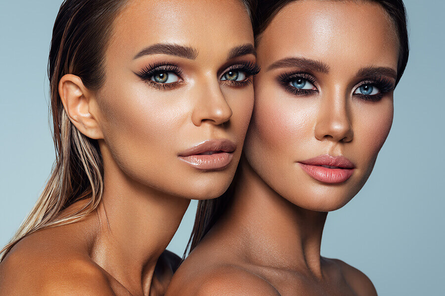 Headshot of two female models side by side