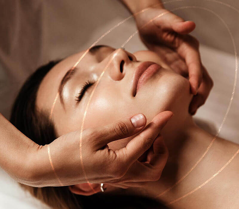 Woman enjoying face massage