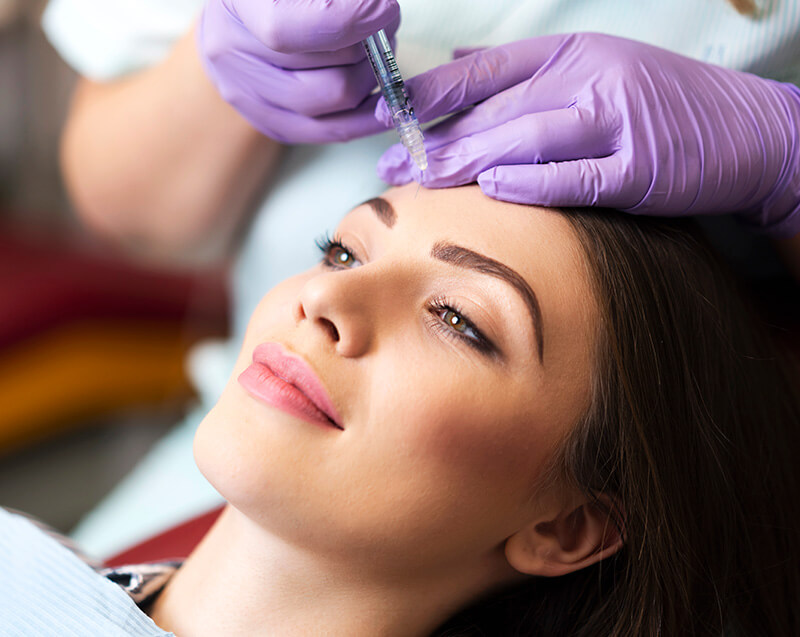 Woman getting an injection