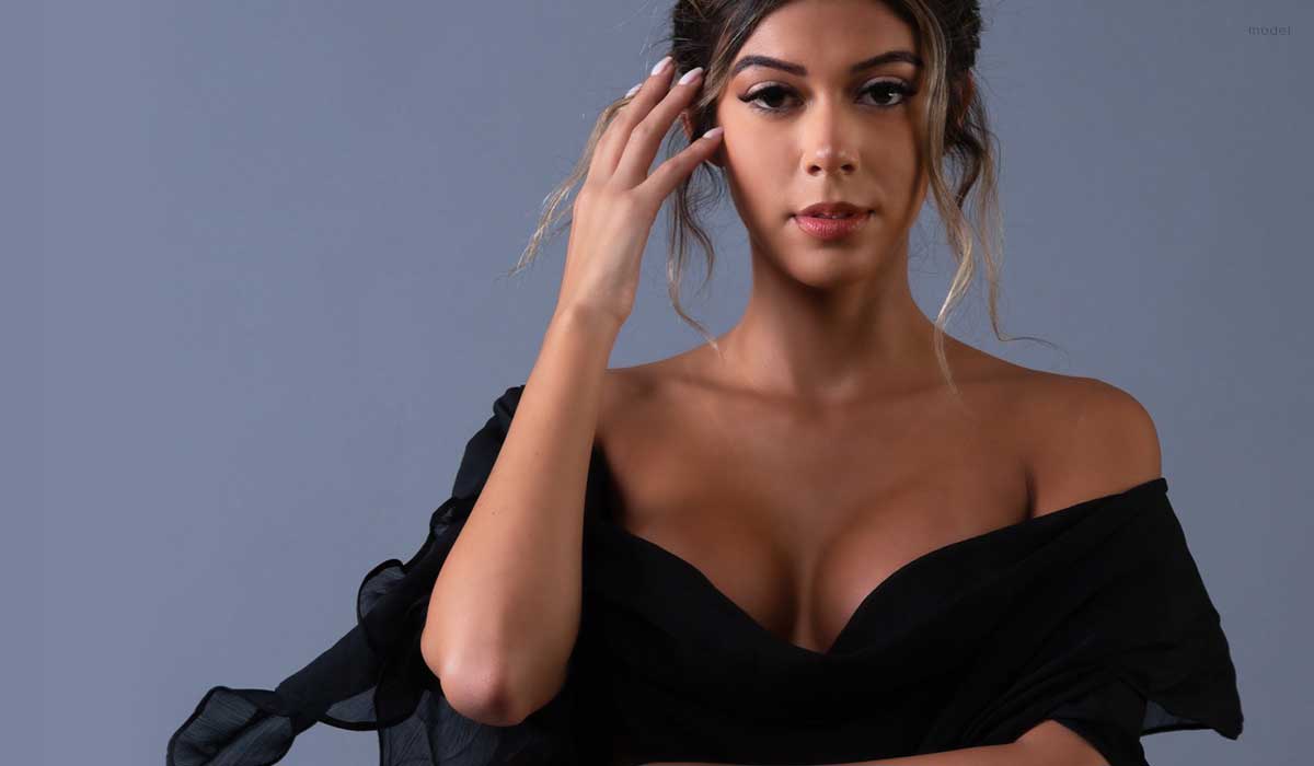 Female model in lower cut dress