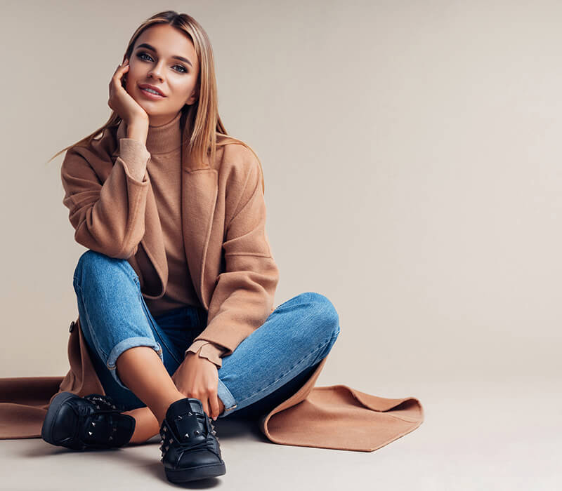 Beautiful woman in brown coat