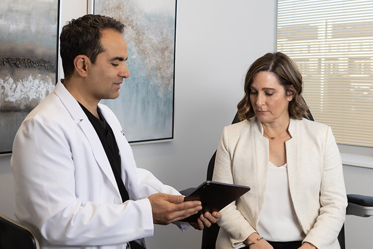 Dr. Nukta with a Patient